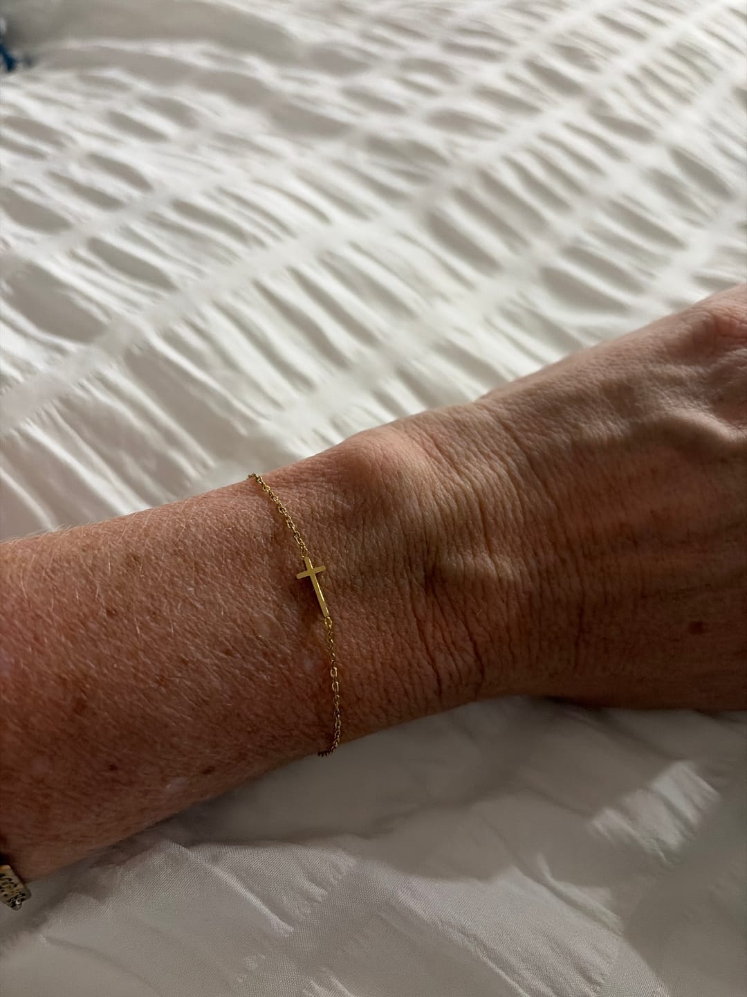 Customer photo review of The Delicate Cross Bracelet