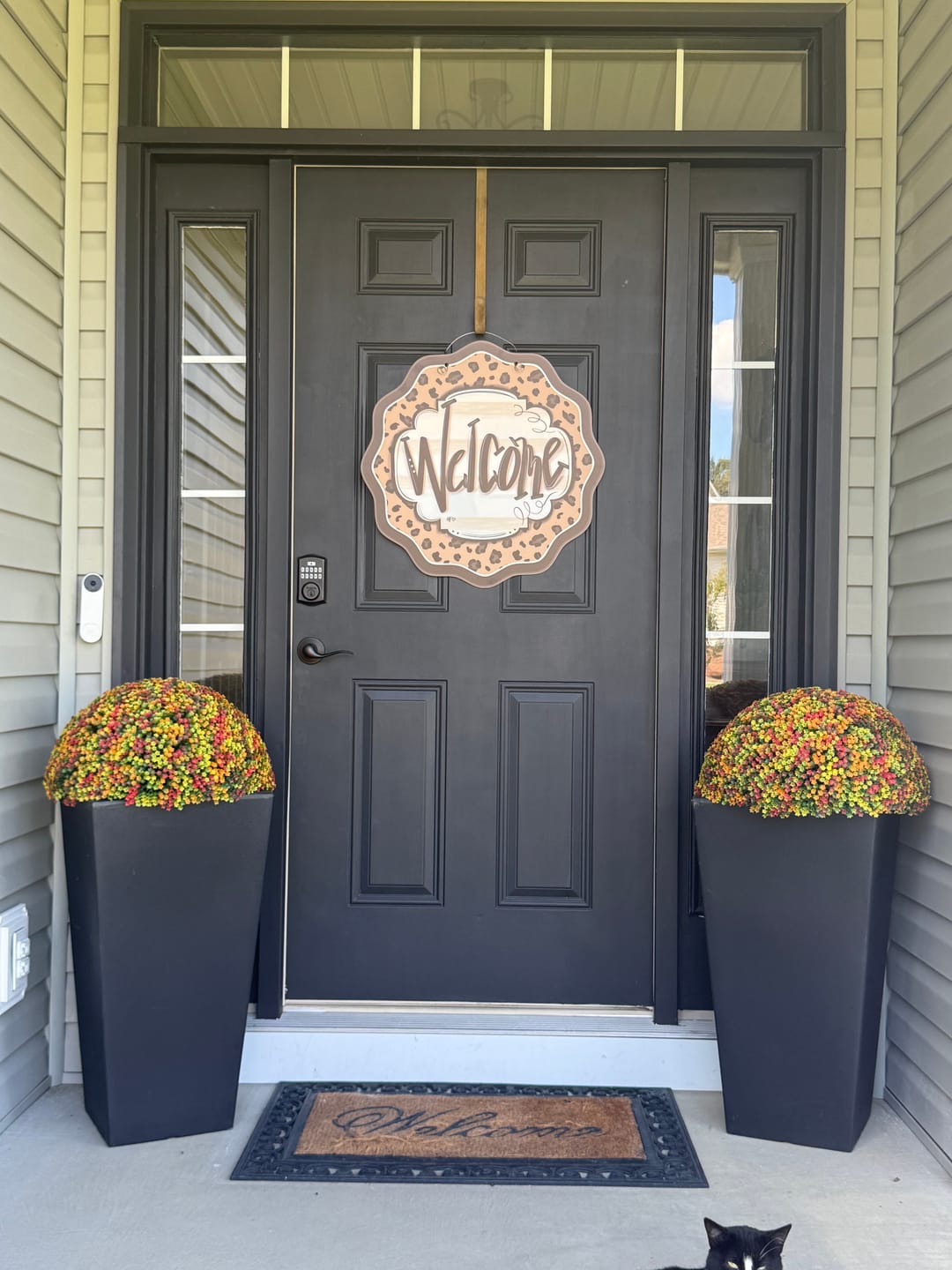 Customer photo review of Leopard Cheetah Welcome Door Hanger