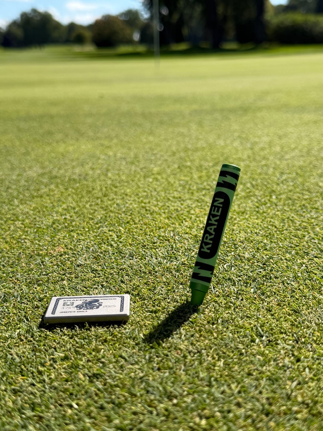 Customer photo review of The Silver Kraken Express Ball Marker | Kraken Titanium Golf Ball Marker