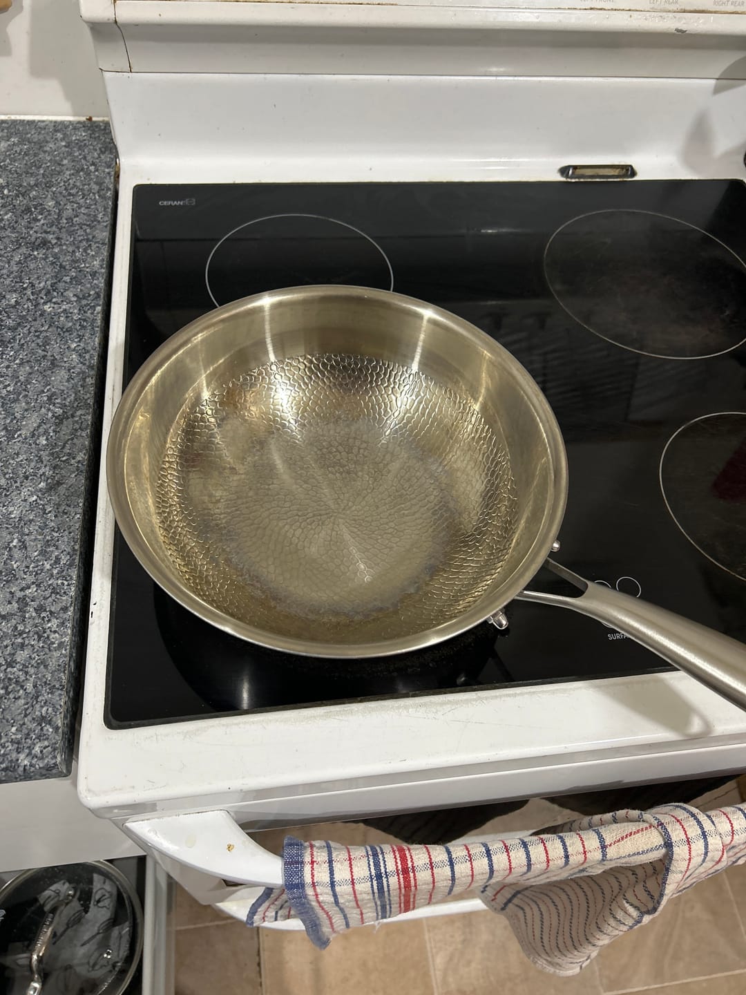 Customer photo review of Hand-Hammered Titanium Wok Pan with Flat Base