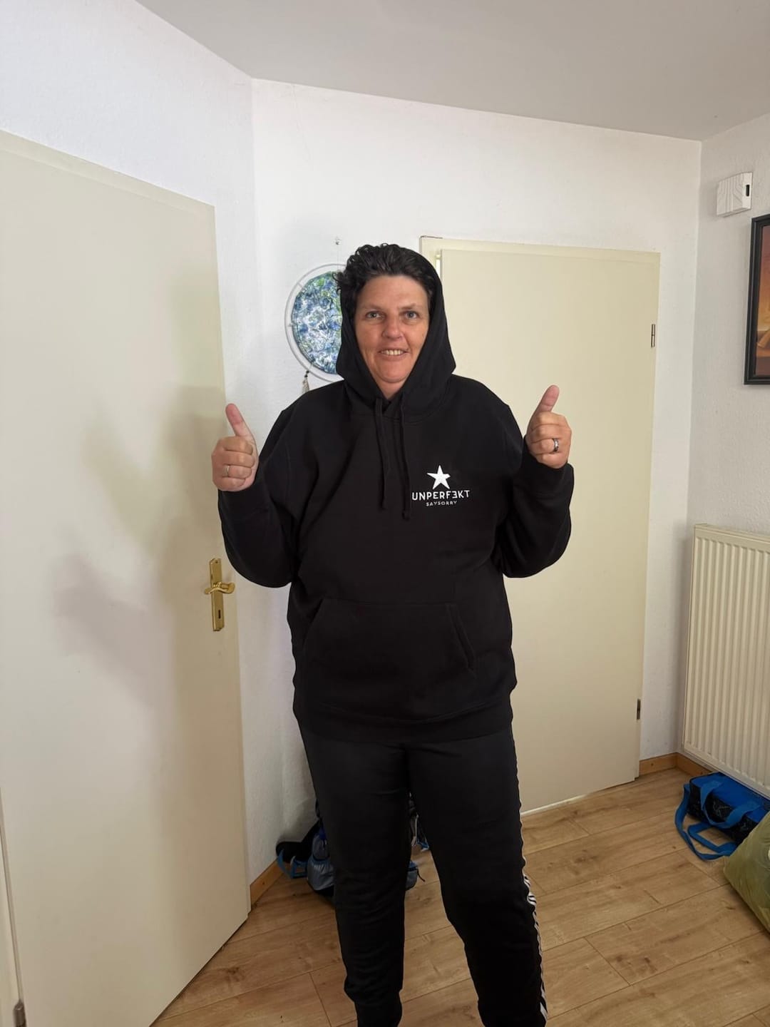 Customer photo review of Organic unisex Hoodie »Unperfekt« Stern vorne bestickt, hinten bedruckt