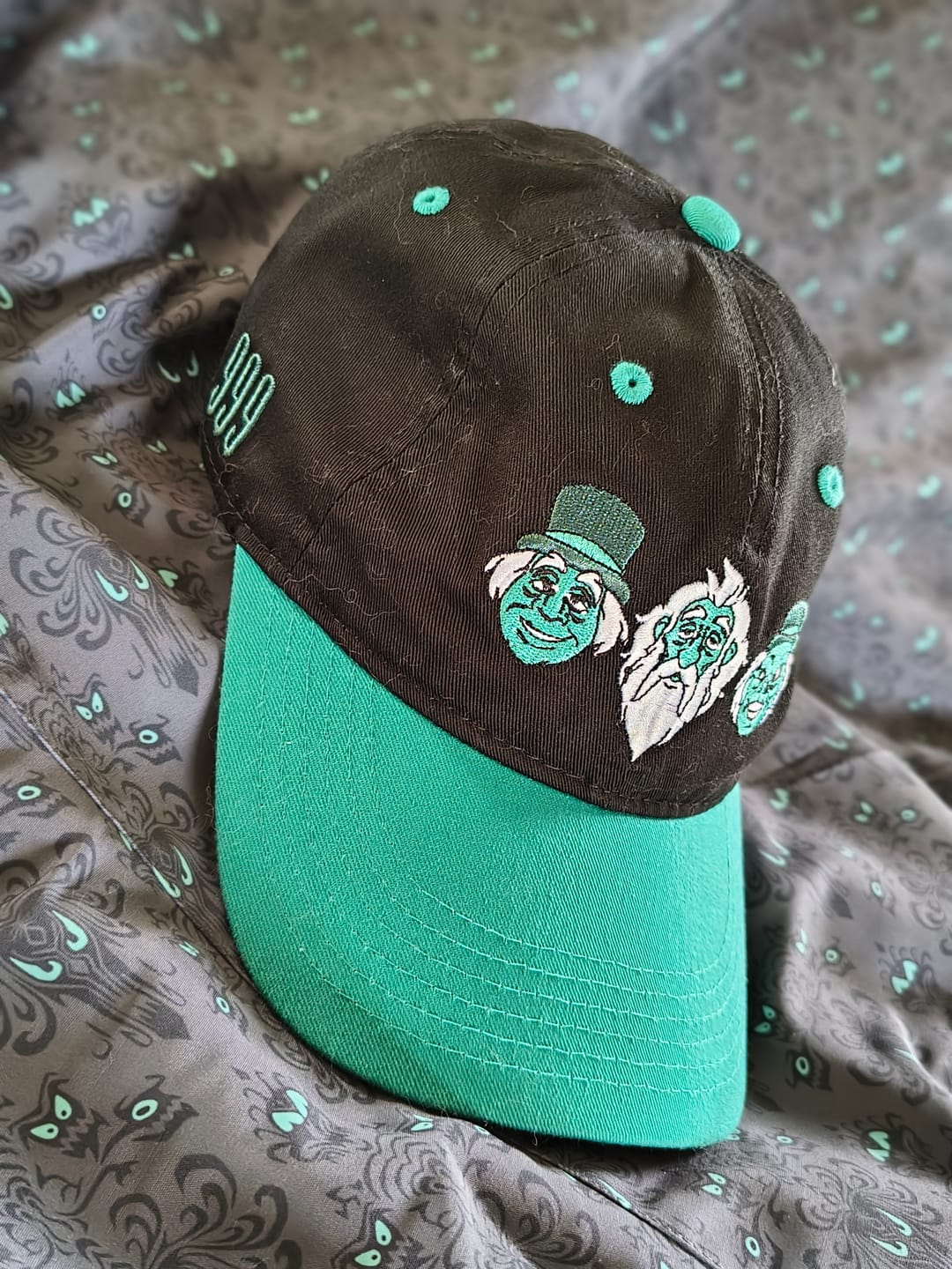 Customer photo review of Disney's Haunted Mansion "Hitching a Ride" – Dad Hat