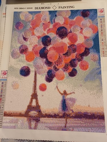 Customer photo review of Light as a feather: woman with balloons at the Eiffel Tower | Diamond Painting Kit