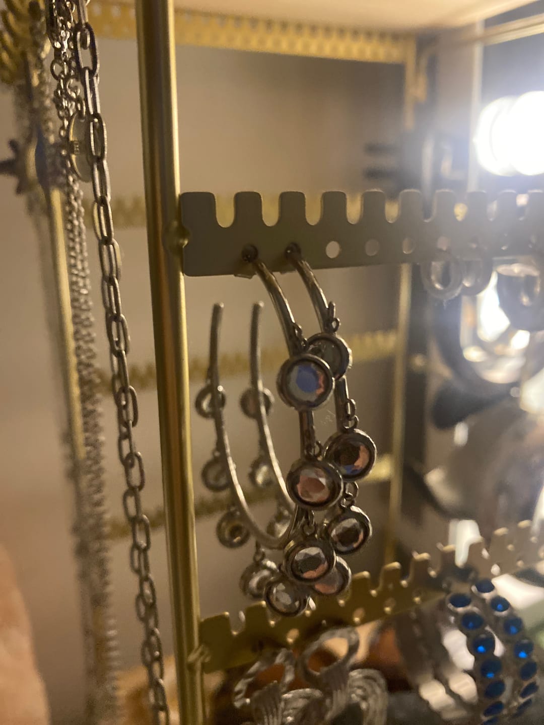 Customer photo review of Faiza Droplet Statement Hoops Crystal  & Silver