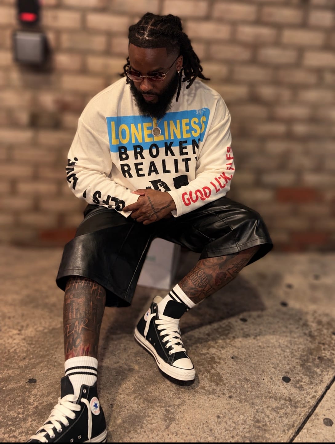 Customer photo review of Distressed Graphic Waffle Long Sleeve Tee