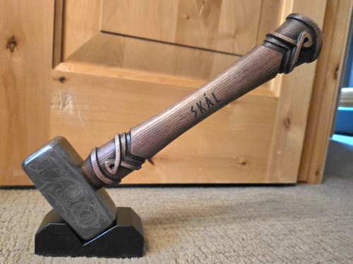 Customer's Premium Viking Hammer Stormar with custom wood handle on display stand