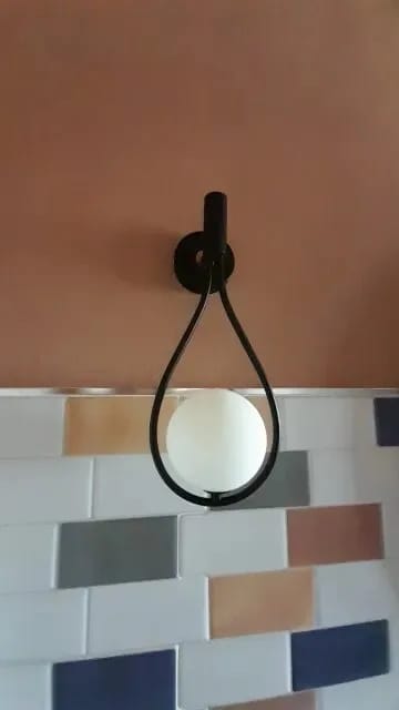 Customer photo review of Iron Arm Wall Sconce for Bedroom, Opal Glass Globe, 37 cm
