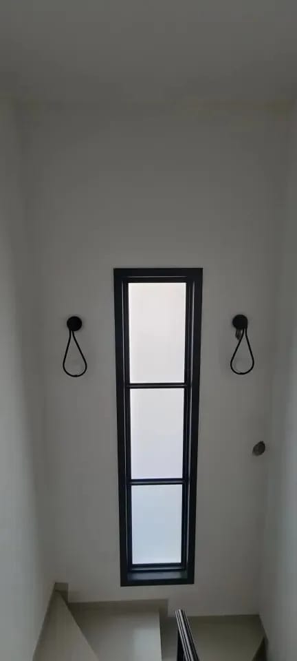 Customer photo review of Iron Arm Wall Sconce for Bedroom, Opal Glass Globe, 37 cm