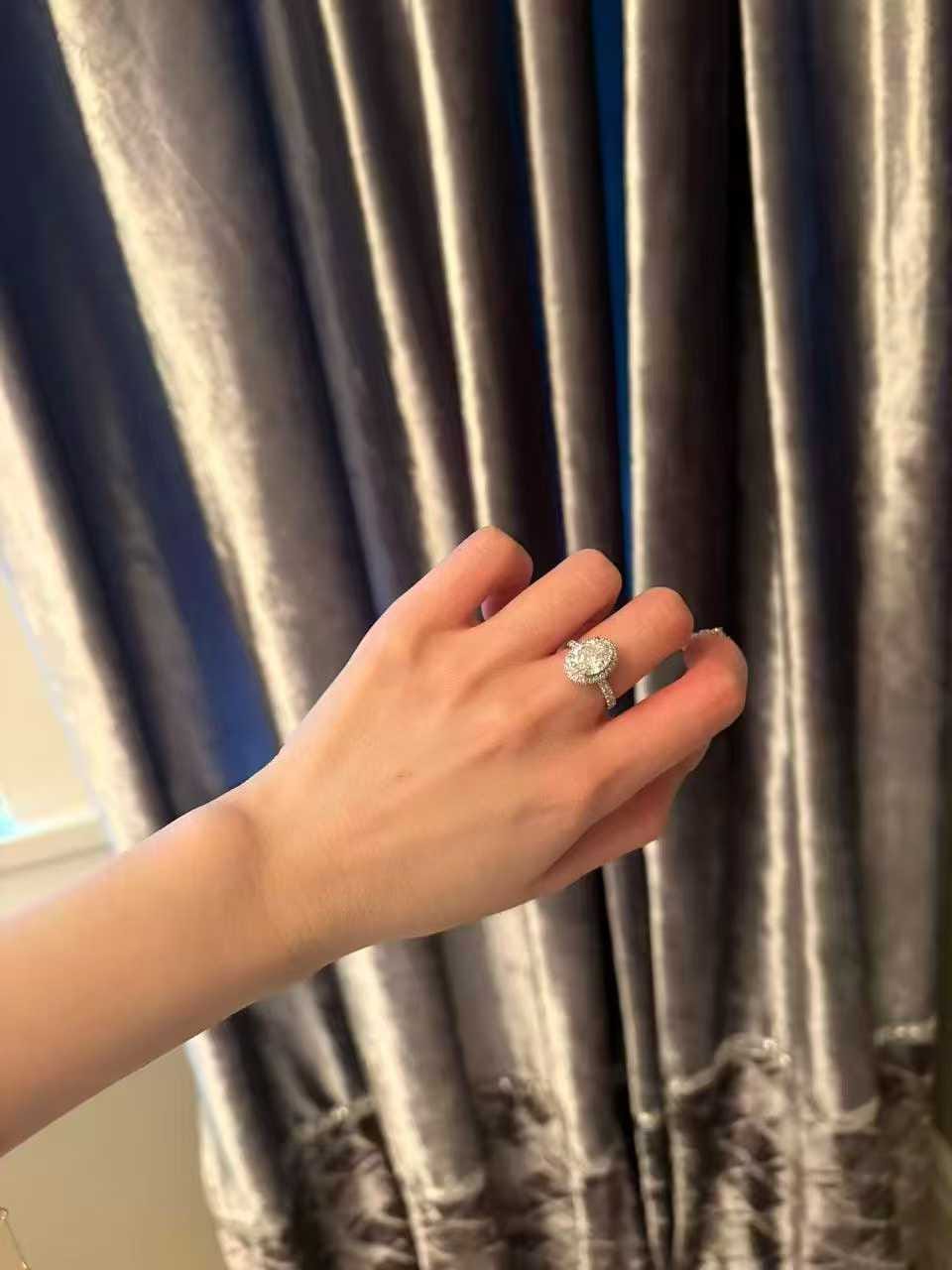 Customer photo review of Infinity Halo Pavé Oval Cut Diamond Ring