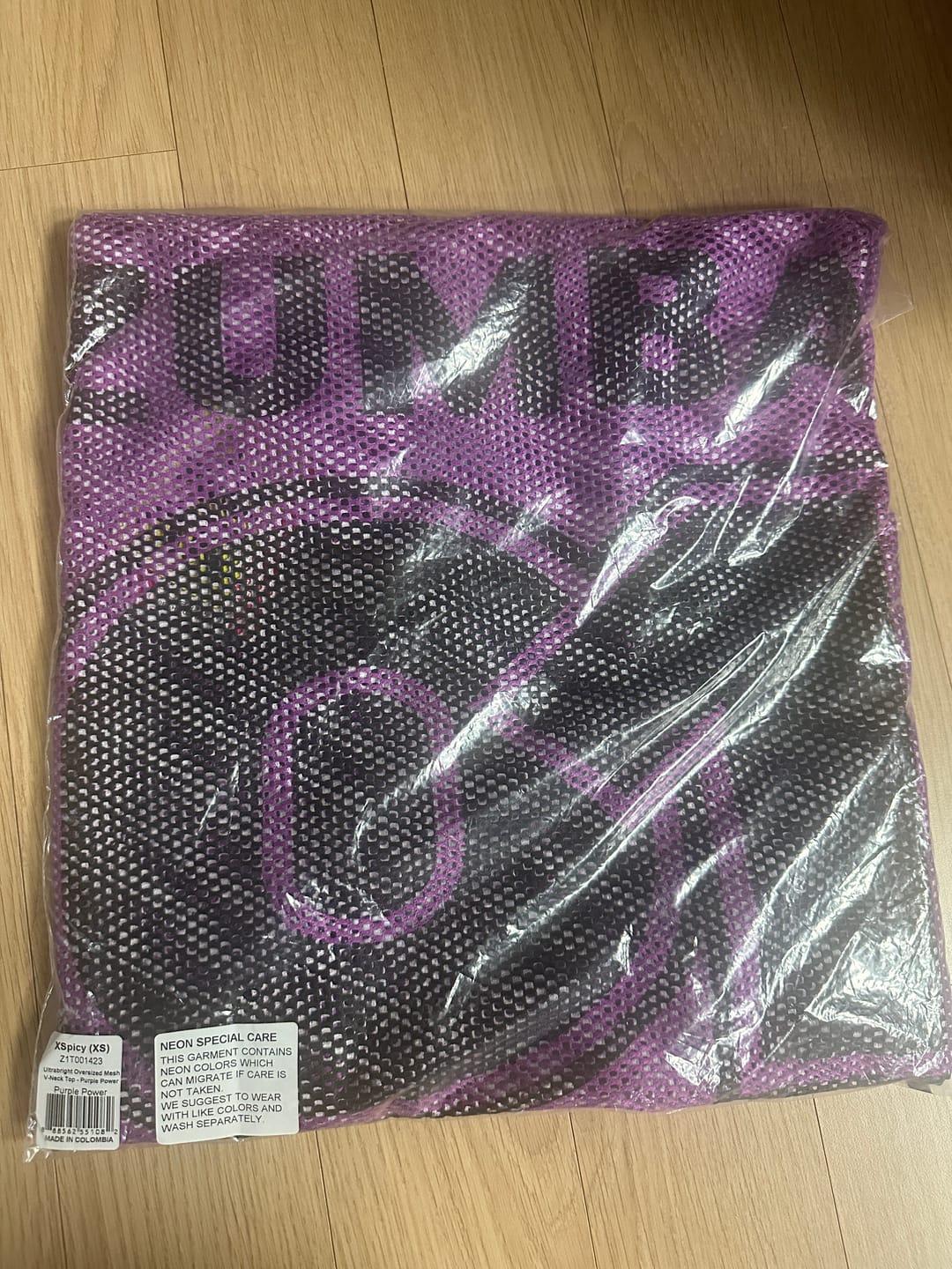 Customer photo review of Ultrabright Oversized Mesh V-Neck Top