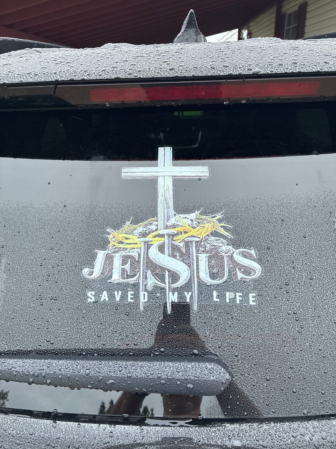 Customer photo review of Christianartworkshop Cross Crown of Thorns Nails JESUS SAVED MY LIFE Waterproof Car Sticker: A Symbol of Redemptive Sacrifice