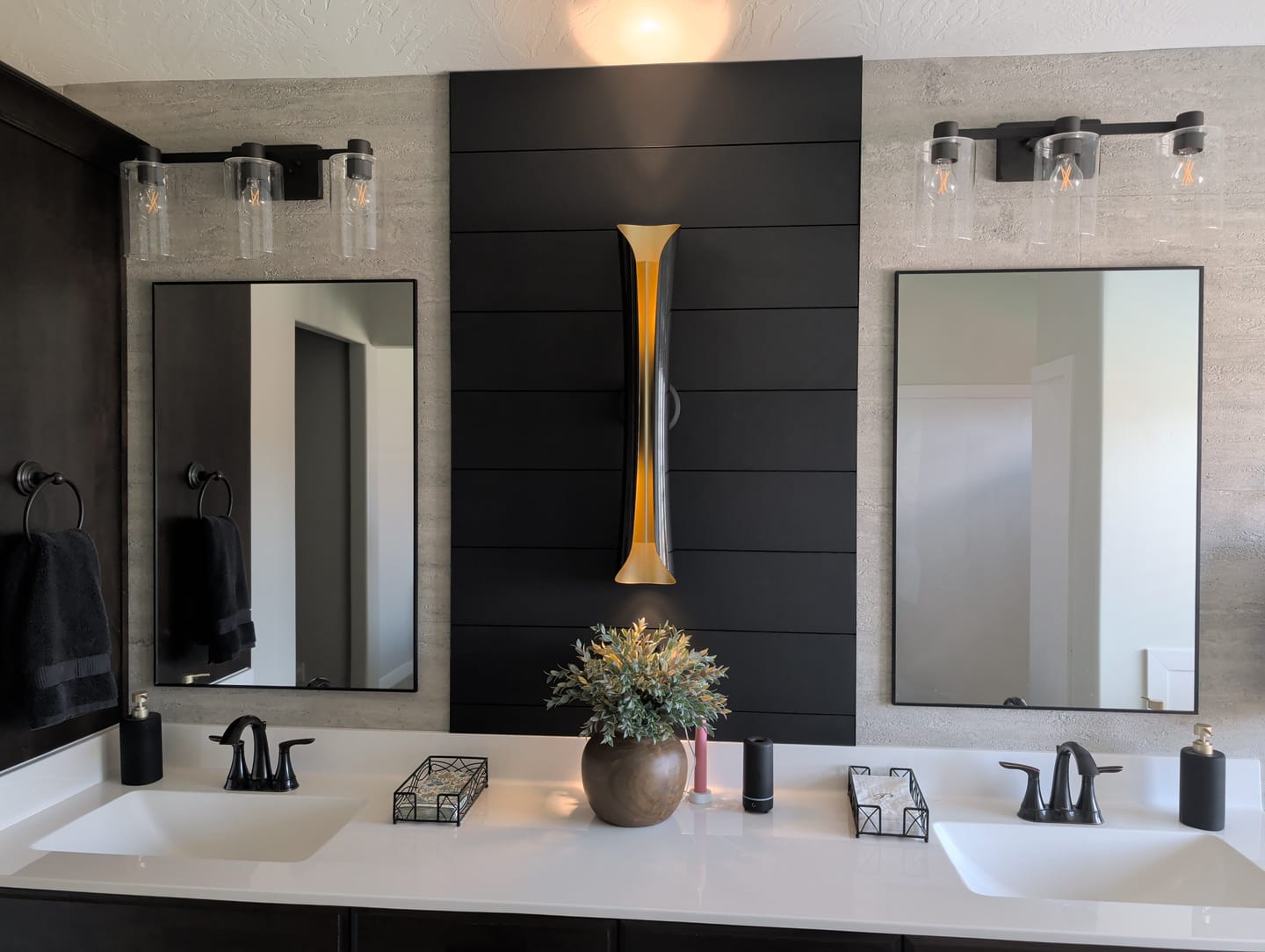 Customer photo review of Modern Curl Black and Gold Up Down Bedside Wall Sconce