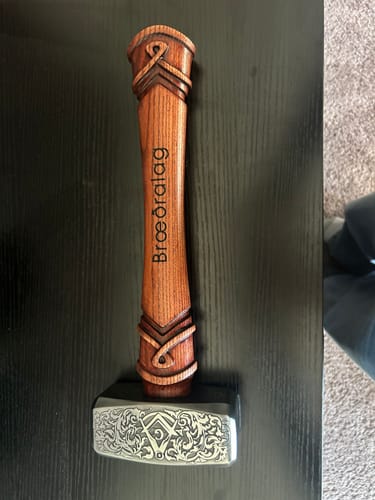 Customer's Make It Unique custom engraved wooden handle and decorative metal head of the hammer.