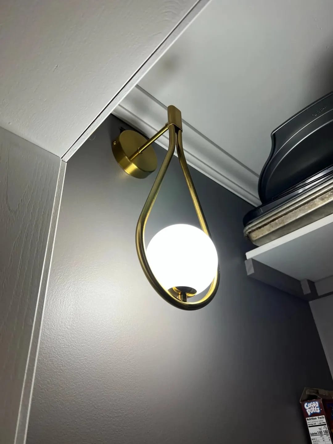 Customer photo review of Iron Arm Wall Sconce for Bedroom, Opal Glass Globe, 37 cm