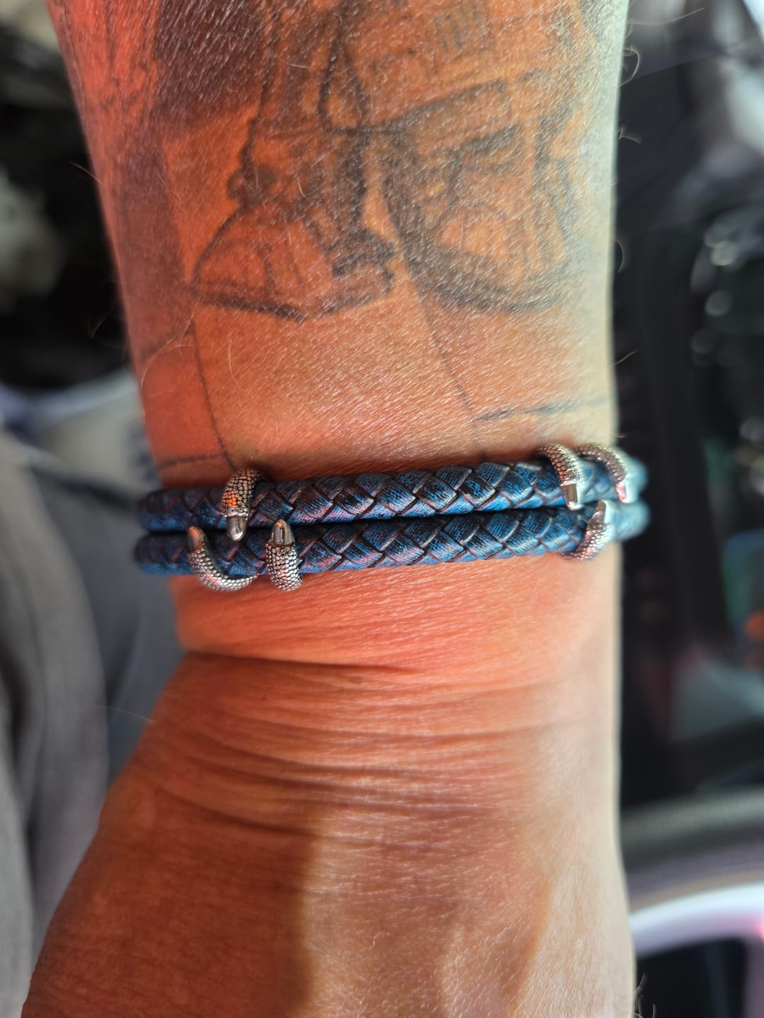 Customer photo review of Buddha Stones Braided Leather Dragon Claw Strength Stainless Steel Bracelet