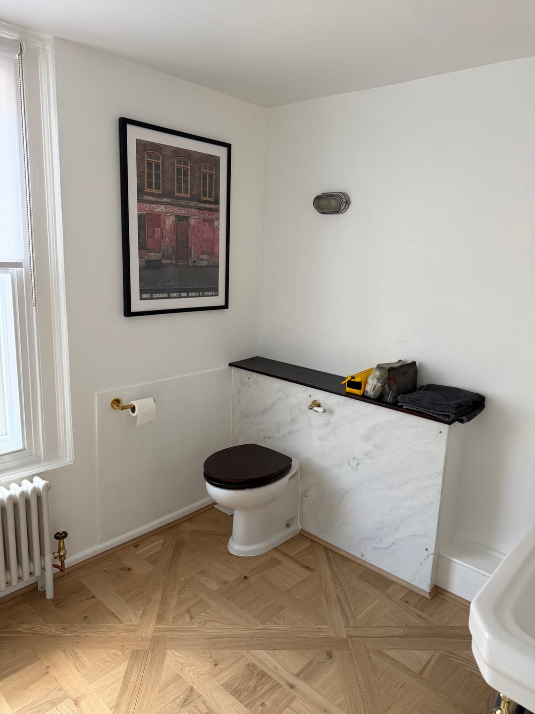 Customer photo review of Luxe Knurled Brass Toilet Roll Holder