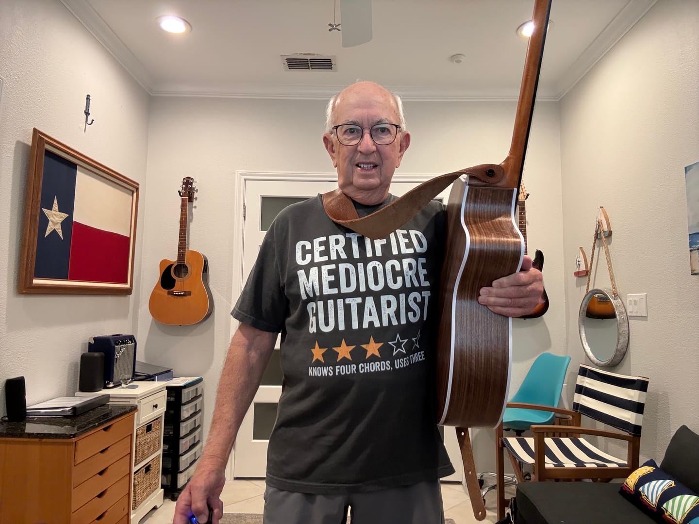 Customer photo review of Mediocre Guitarist T-shirt
