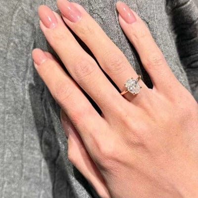 Customer photo review of 4 Prong Solitaire Oval Cut Diamond Engagement Ring 3mm Band