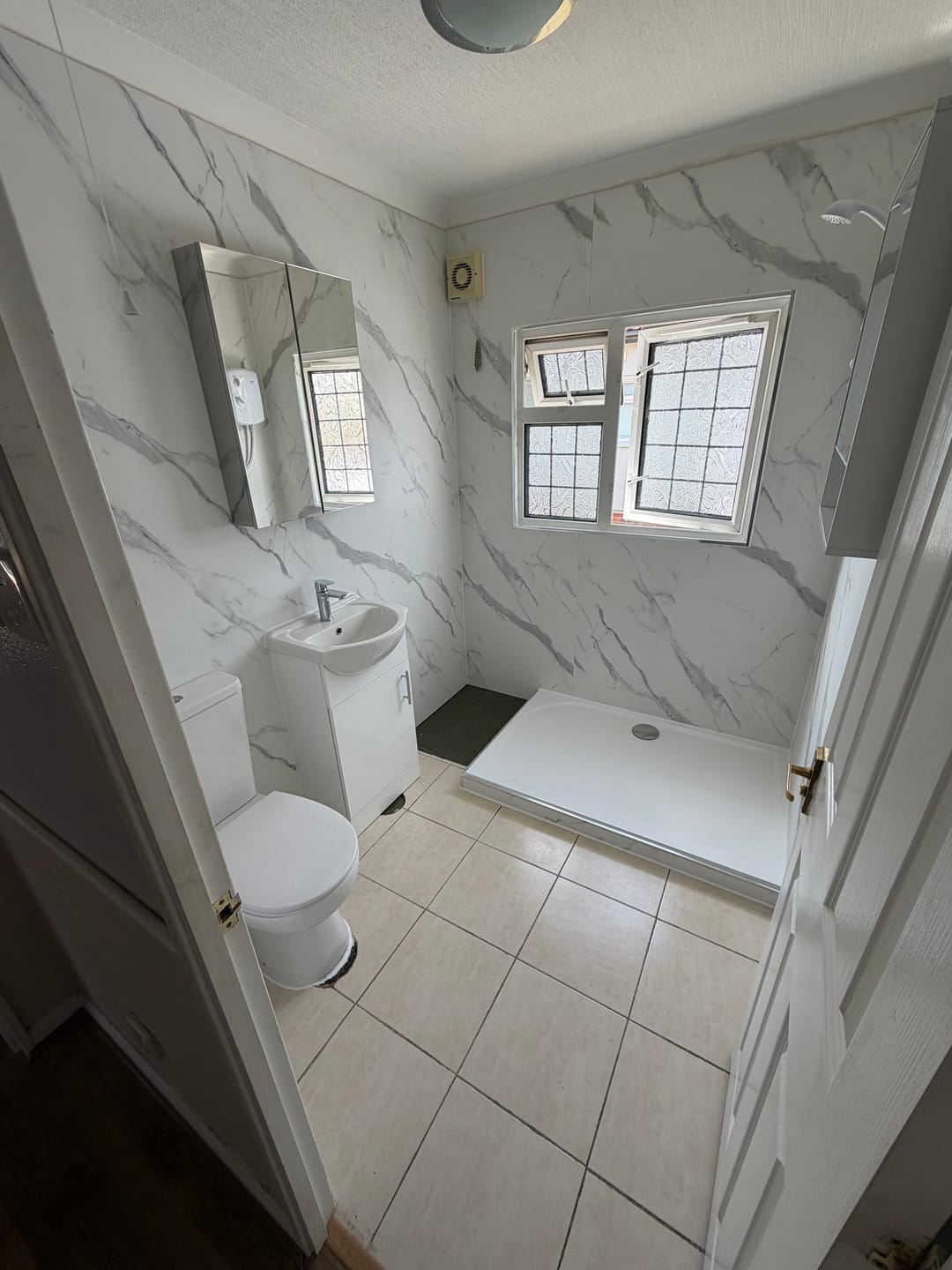 Customer photo review of 10mm Carrara Marble Matt Shower Panel 1M x 2.4M
