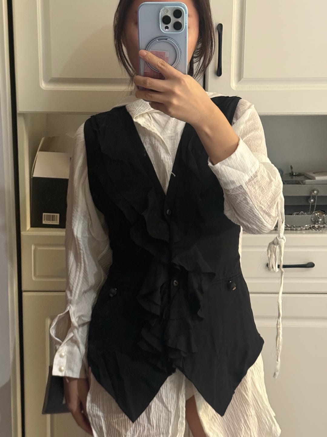 Customer photo review of DOINDULGE Ruffled Tie Deconstructed Vest