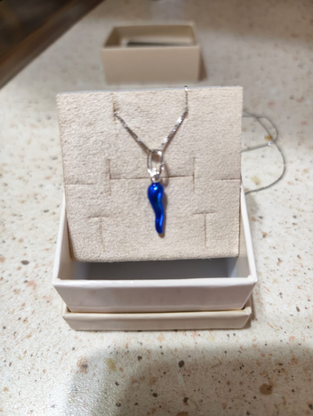 Customer photo review of Collana Corno Blu Portafortuna