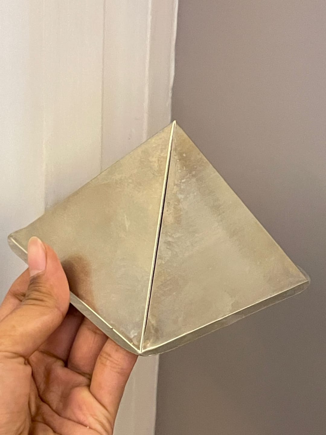 Customer photo review of Tri-Dhatu Hollow Vastu Pyramid – Alloy Metal Vastu Remedy for Protection & Prosperity | Ideal for Home, Office & Spiritual Areas | 4 cm | 120 g
