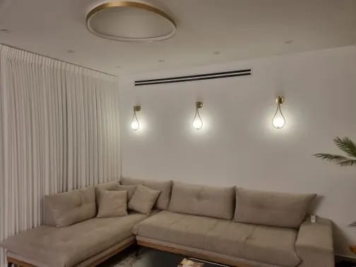 Customer photo review of Iron Arm Wall Sconce for Bedroom, Opal Glass Globe, 37 cm