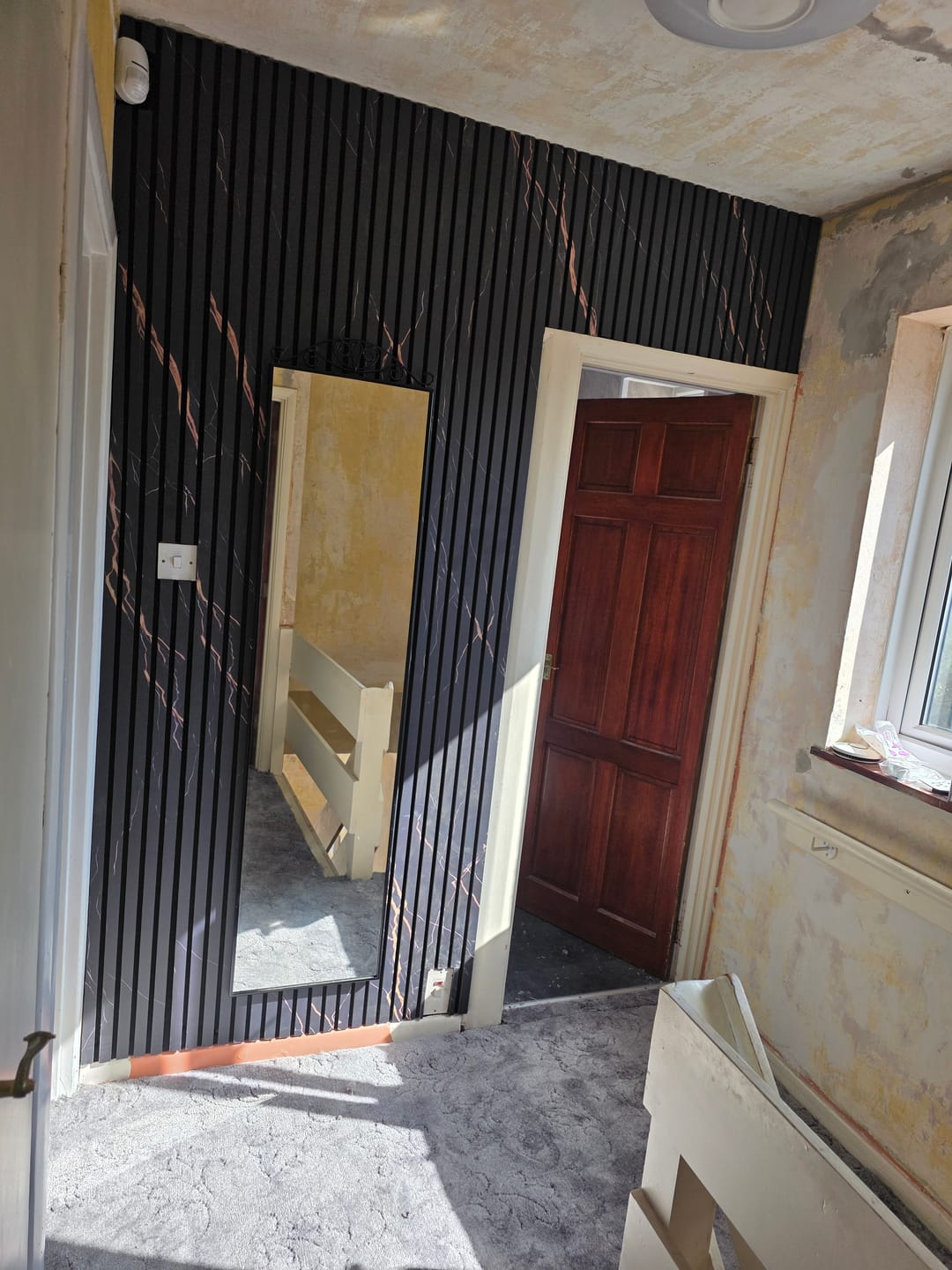 Customer photo review of Black Marble Acoustic Slat Wall Panels — Decorative MDF Wood Panels 2.4m x 0.6m