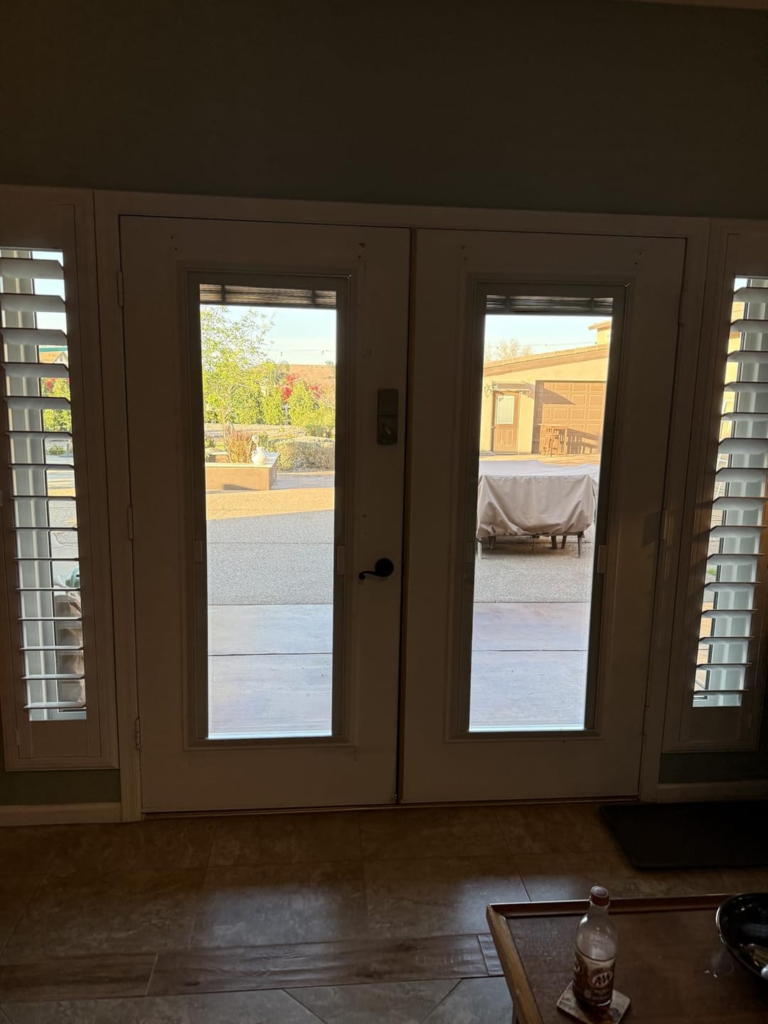 Customer photo review of TENONER 1-Lite Tempered Clear Glass Entry Door Glass Inserts Replacement for Enclosed Shutters Insert Kit