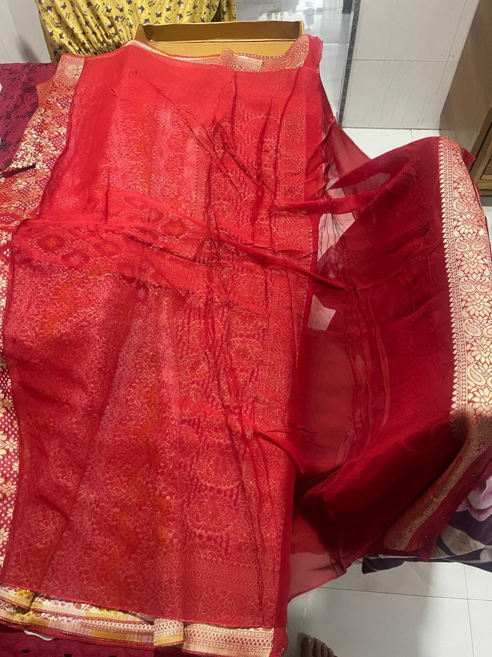 Customer photo review of Red Bandhej Georgette Silk Banarasi Saree