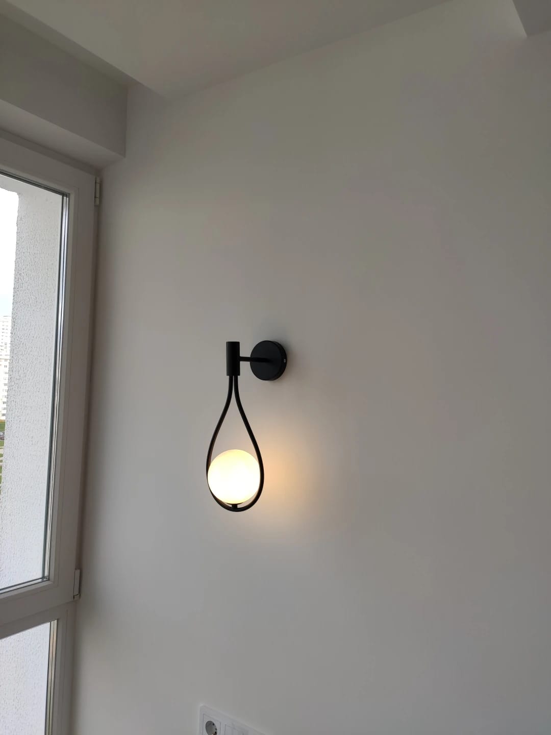 Customer photo review of Iron Arm Wall Sconce for Bedroom, Opal Glass Globe, 37 cm