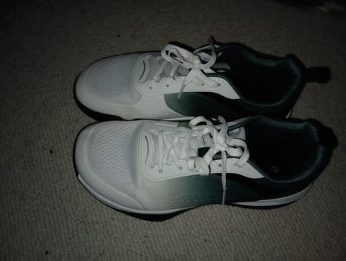 Customer's pair of CUURT Muuv court shoes showing a green fade color and wide toe box design.