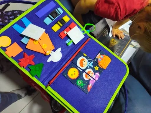Customer photo review of TibaToes Busy Board — książeczka manipulacyjna