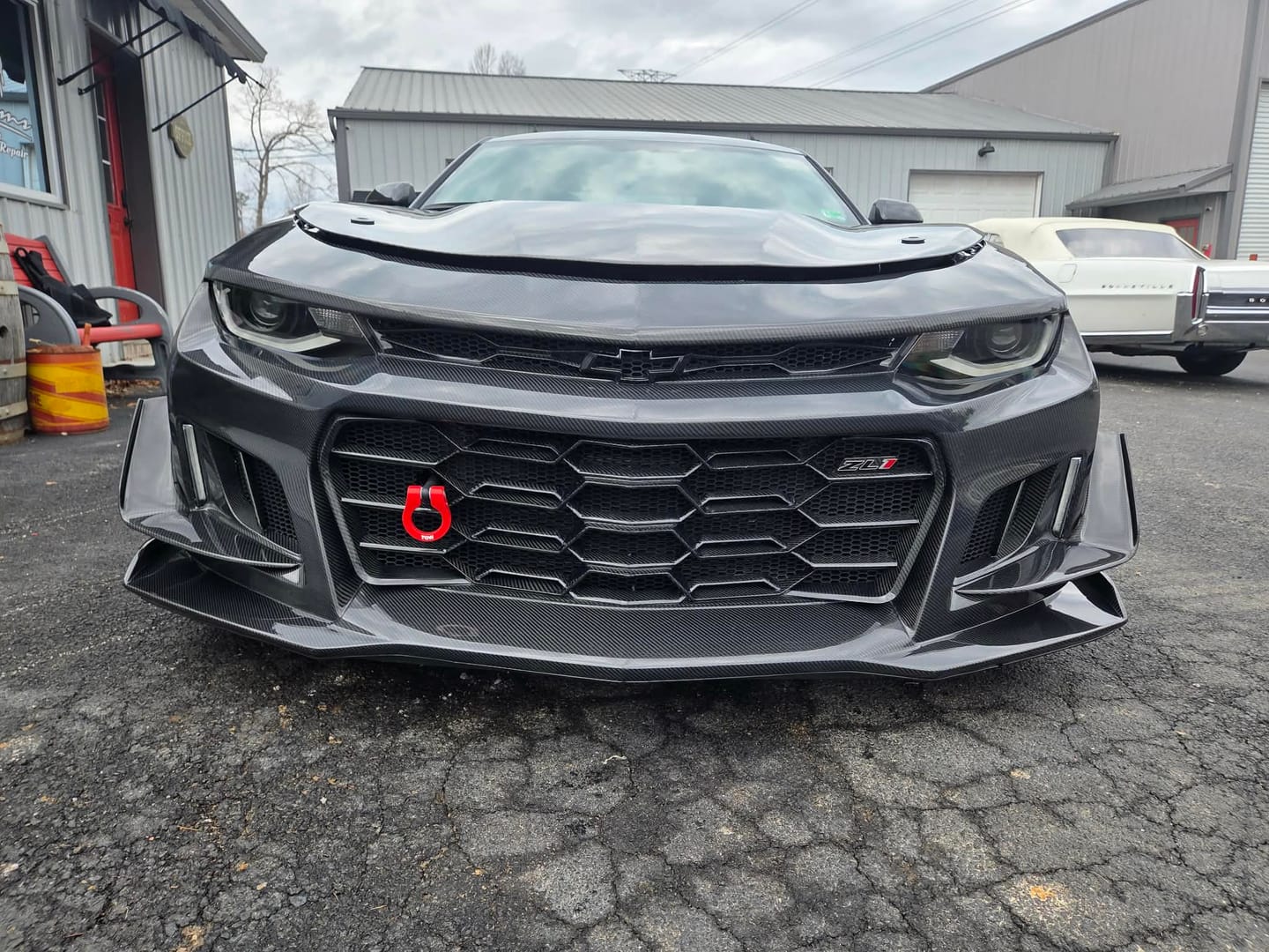 Customer photo review of 2017-2025 Chevy Camaro ZL1 Black Panther 1PC Full Gloss Carbon Fiber Track Package Front Bumper Conversion