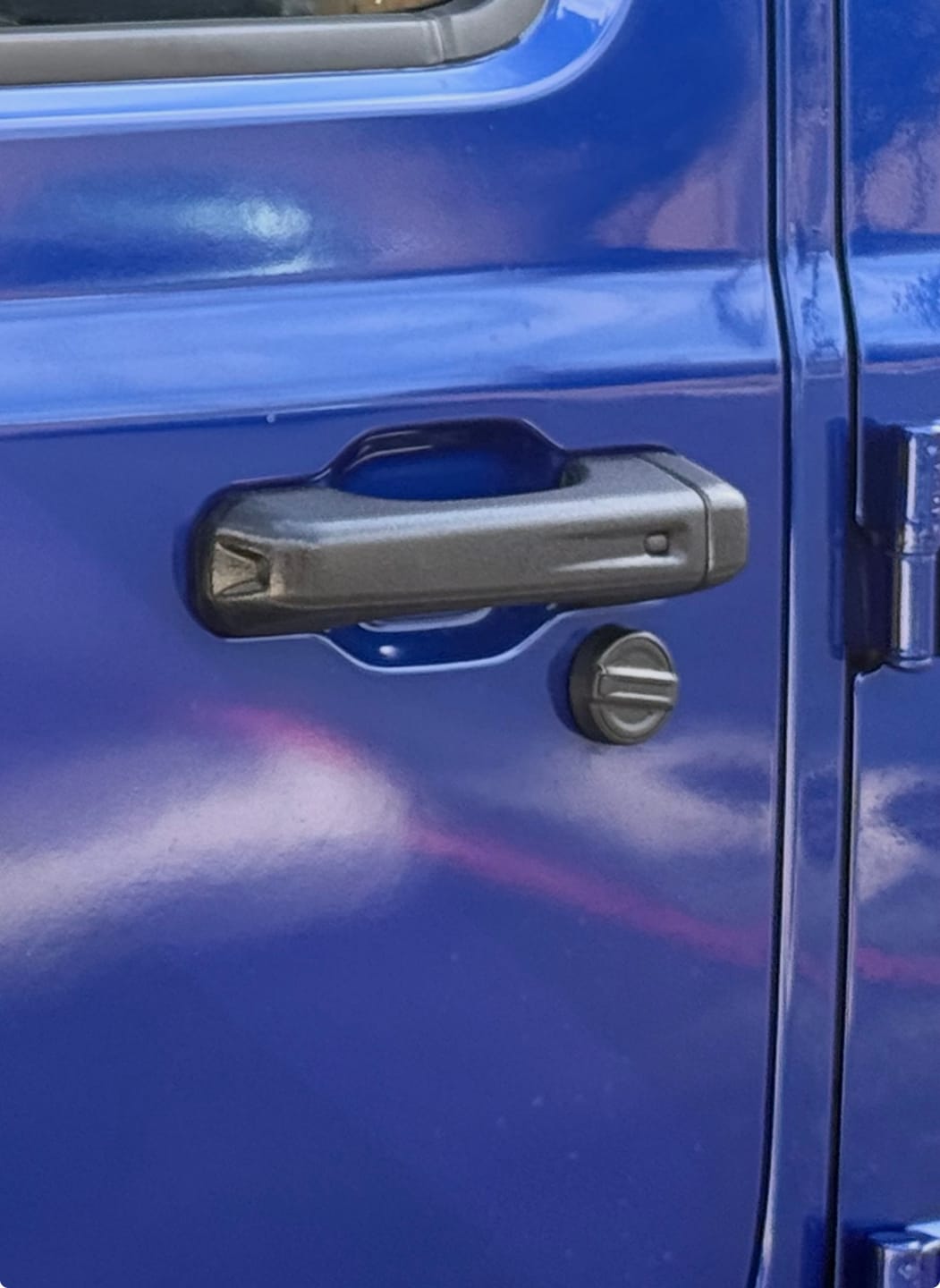 Customer photo review of Raptorized Door Handle Cover Fits  JL Wrangler/JT Gladiator