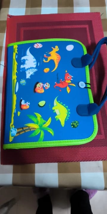 Customer photo review of TibaToes Busy Board — książeczka manipulacyjna