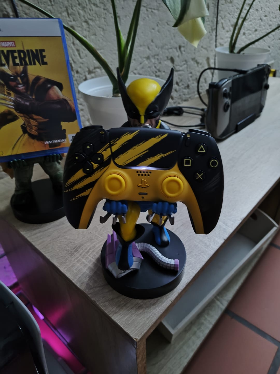 Customer photo review of PlayStation 5 (PS5) DualSense Wireless Controller - Marvel’s Wolverine Battle Yellow Limited Edition + Cable Guy: Wolverine