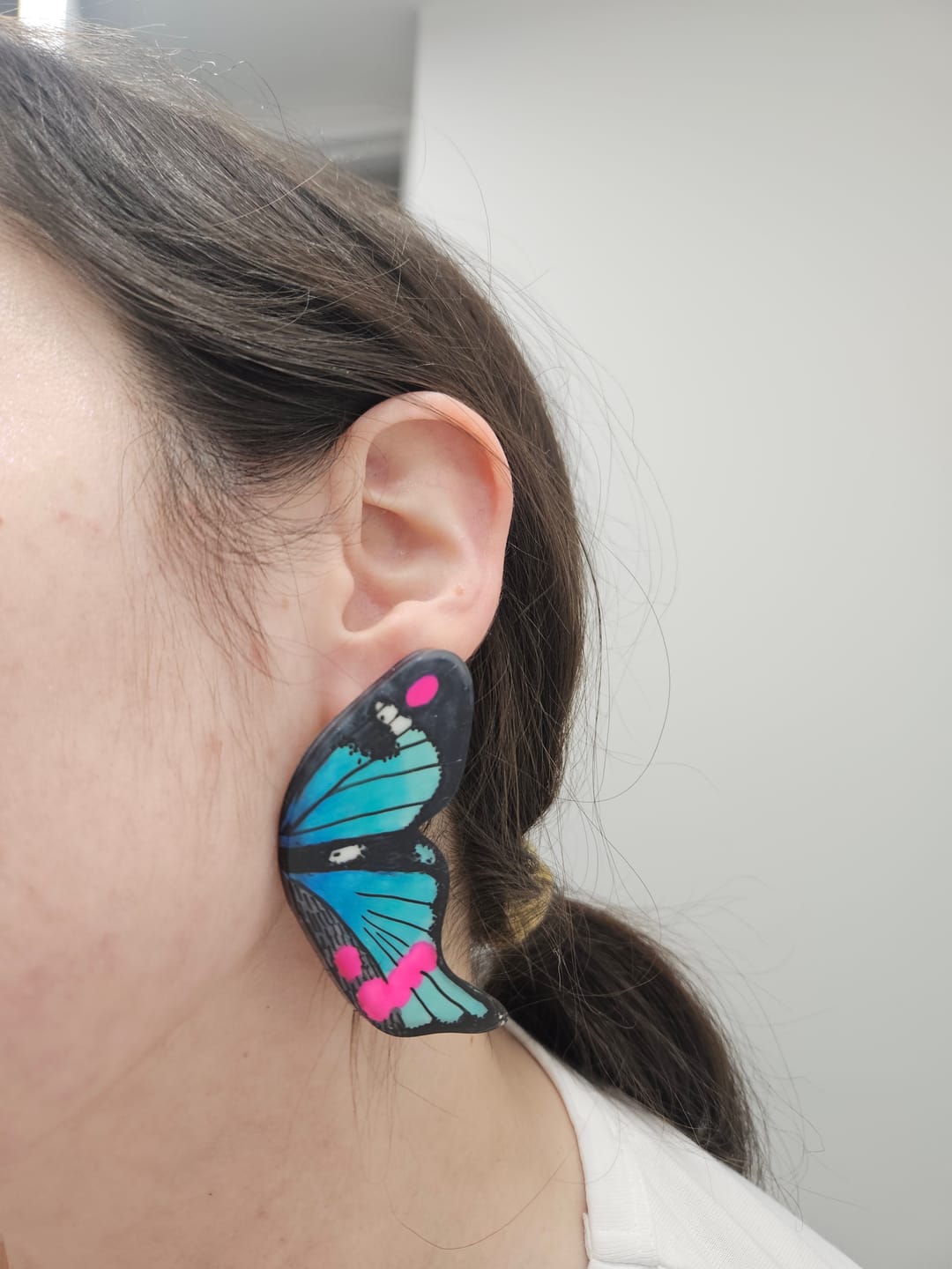 Customer photo review of Aros Ilustración Media Mariposa Periander Verde con Pin