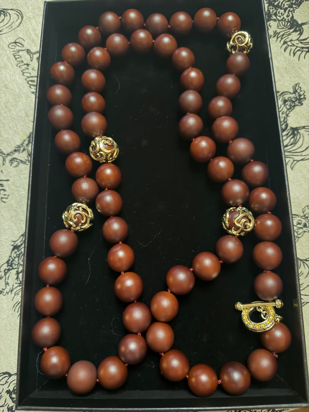 Customer photo review of HEIDI DAUS® “Rooted Elegance” 50-Inch Heritage Scrollwork Wood Necklace