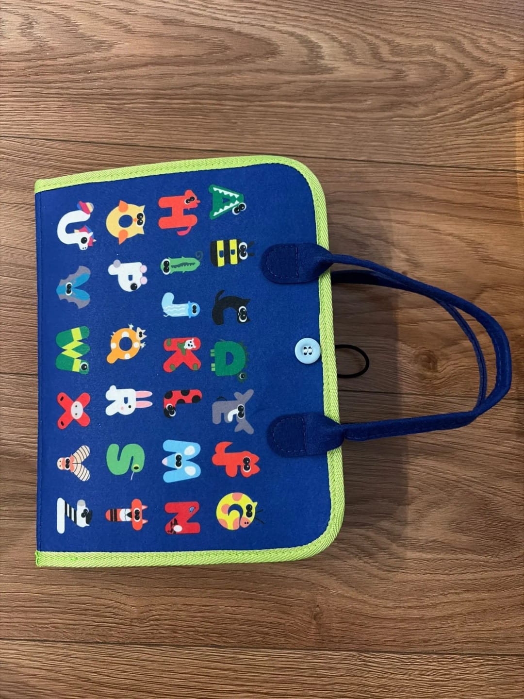 Customer photo review of TibaToes Busy Board — książeczka manipulacyjna