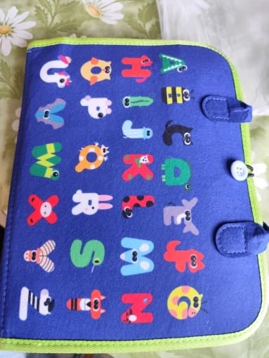 Customer photo review of TibaToes Busy Board — książeczka manipulacyjna
