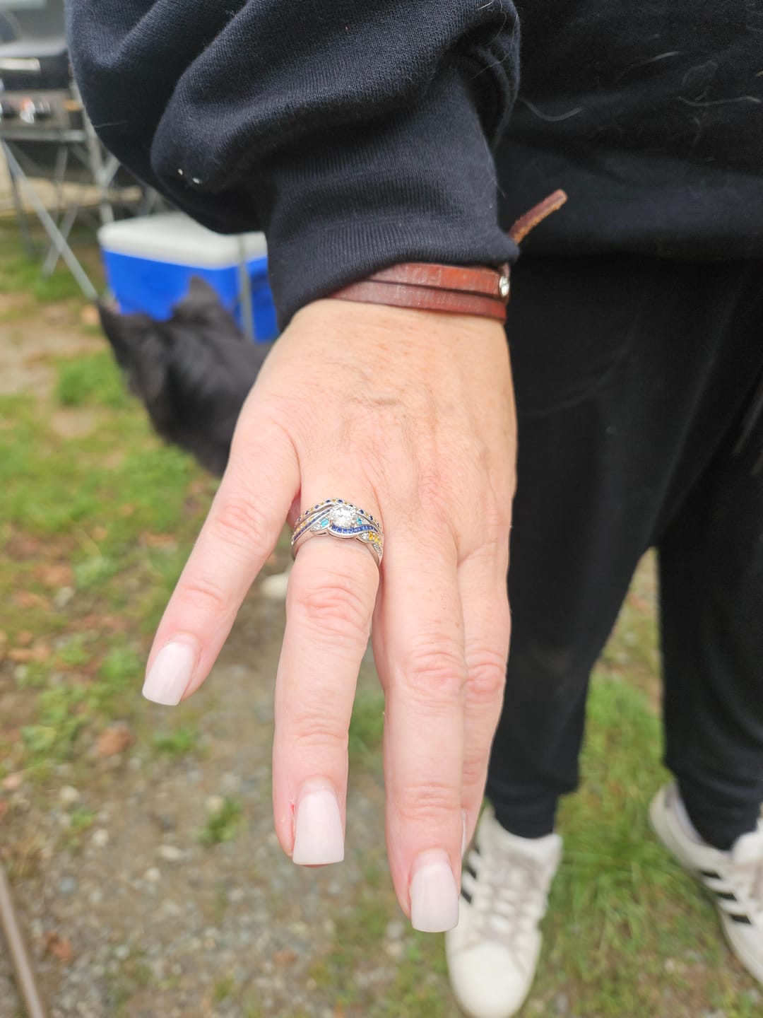 Customer photo review of Starry Night Moissanite Artistic Swirl Accent Engagement Ring