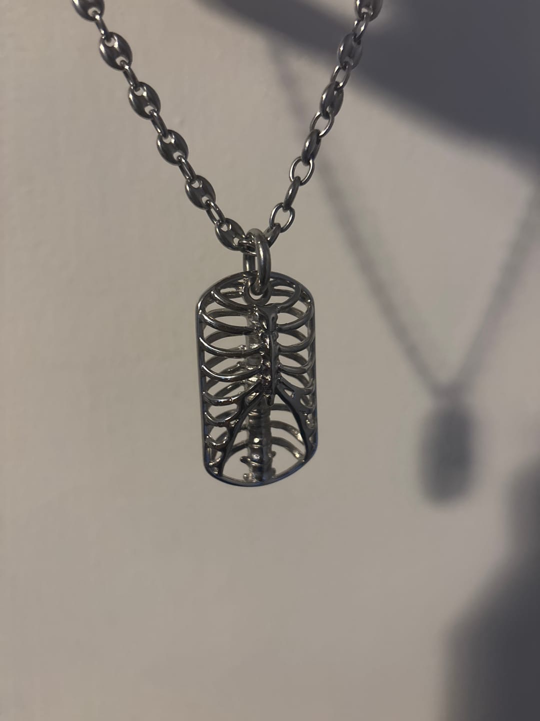 Customer photo review of RIBCAGE DOG TAG NECKLACE