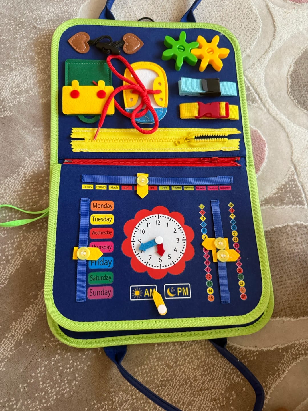 Customer photo review of TibaToes Busy Board — książeczka manipulacyjna