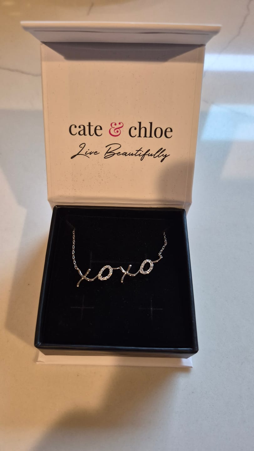 Customer photo review of Jocelyn 18k White Gold Plated XOXO Pendant Necklace with Swarovski Crystals