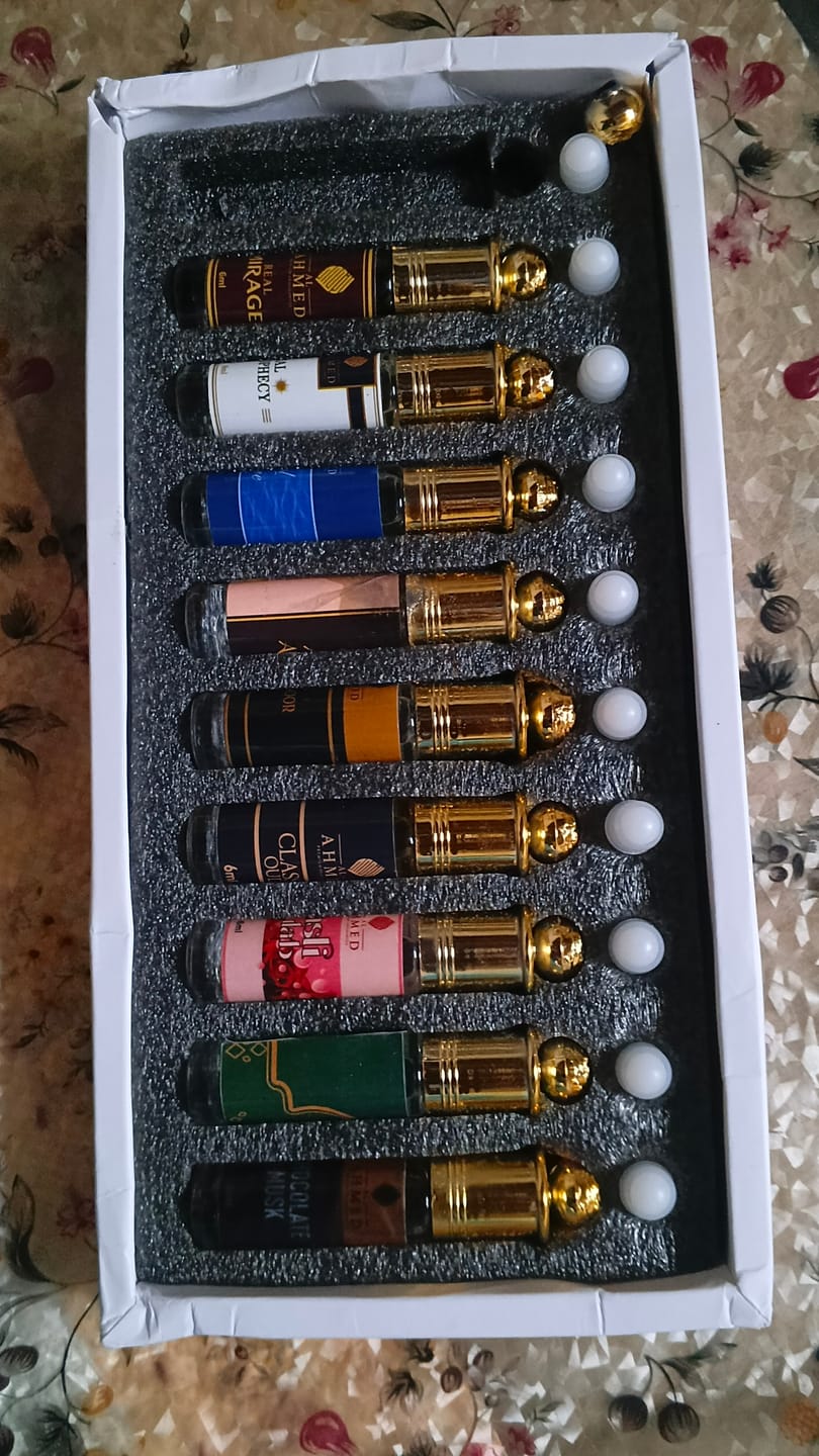 Customer photo review of Al Ahmed 10 PCS Aura Attar Collection | 6ml Each | Alcohol-Free Concentrated Perfume Oil | Long-Lasting Unisex Attar Gift Set for Men & Women | Premium Fragrance Combo