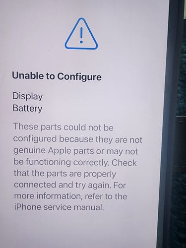 Customer's Apple iPhone 14 screen showing an Unable to Configure notification for display and battery parts.