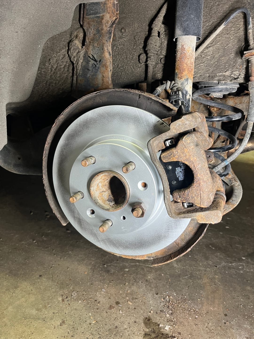 Customer photo review of Rear Coated Disc Brake Rotors And Ceramic Pads Kit For Mazda 3 CX-3 Sport KGT-101944