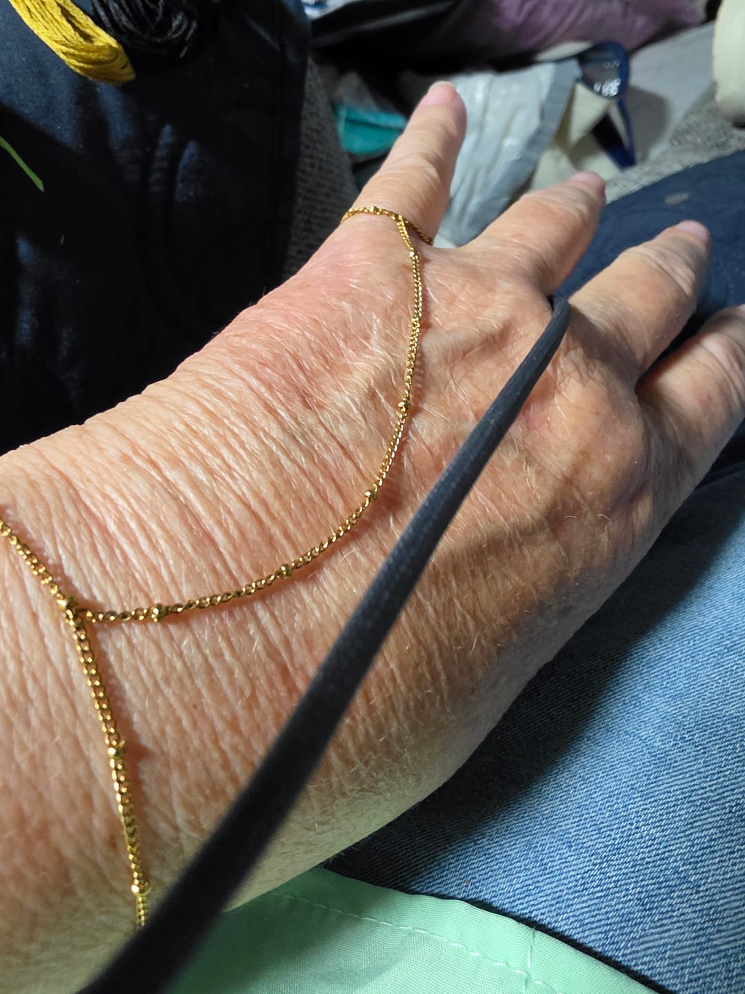 Customer photo review of Free 18K Gold Hand Chain Bracelet