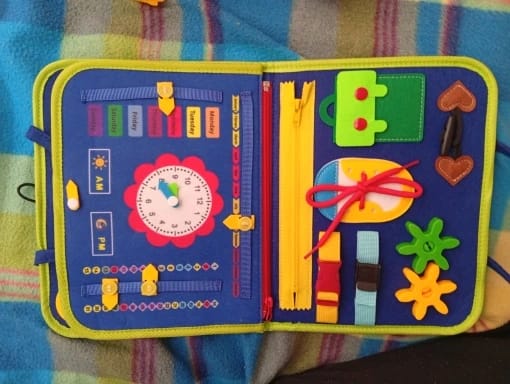 Customer photo review of TibaToes Busy Board — książeczka manipulacyjna